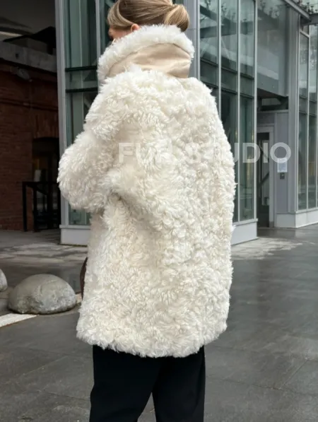 Белая шубка из тиградо - фото 9